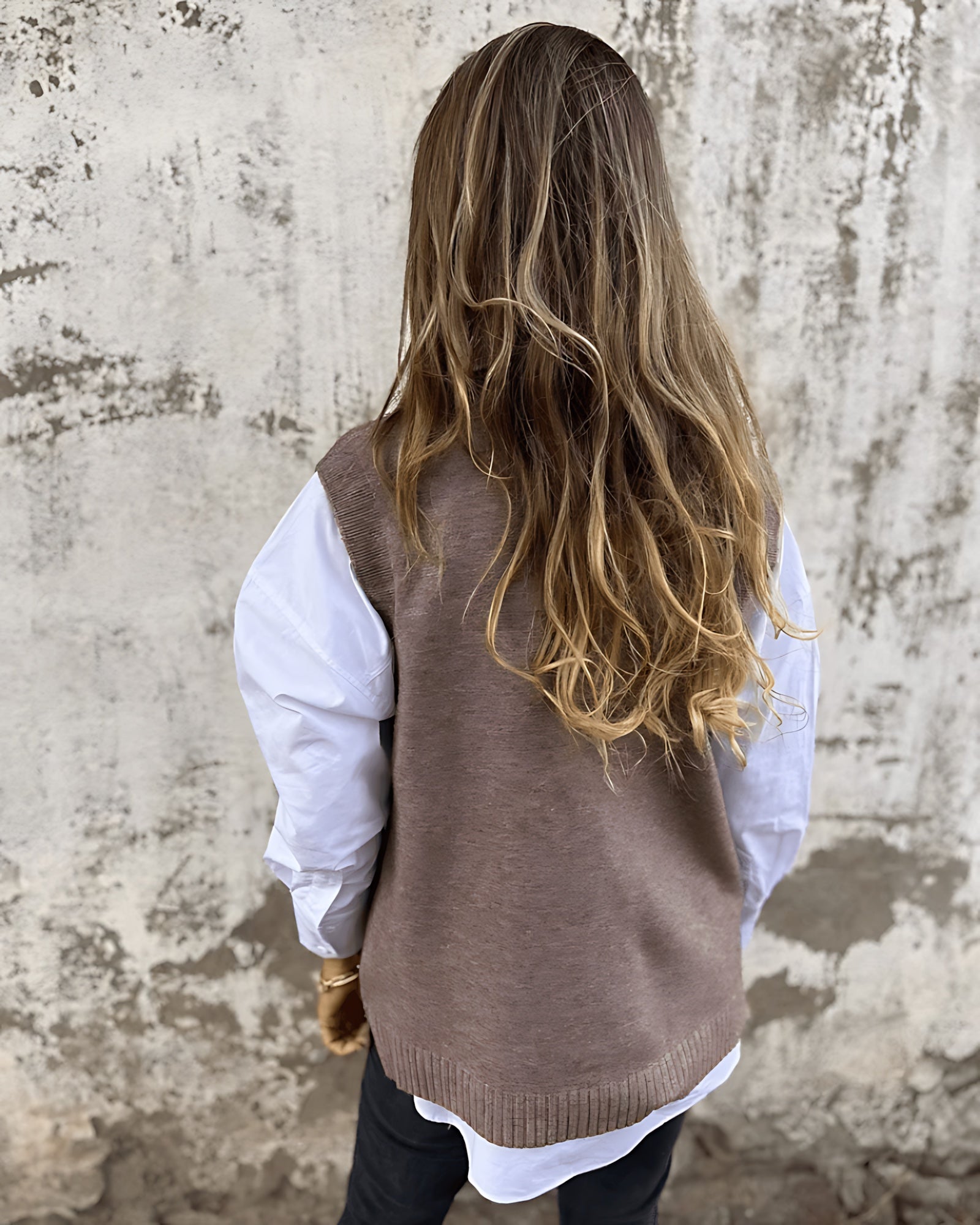 Relaxed Knit Sweater Vest with Deep V-Neckline and Ribbed Trim
