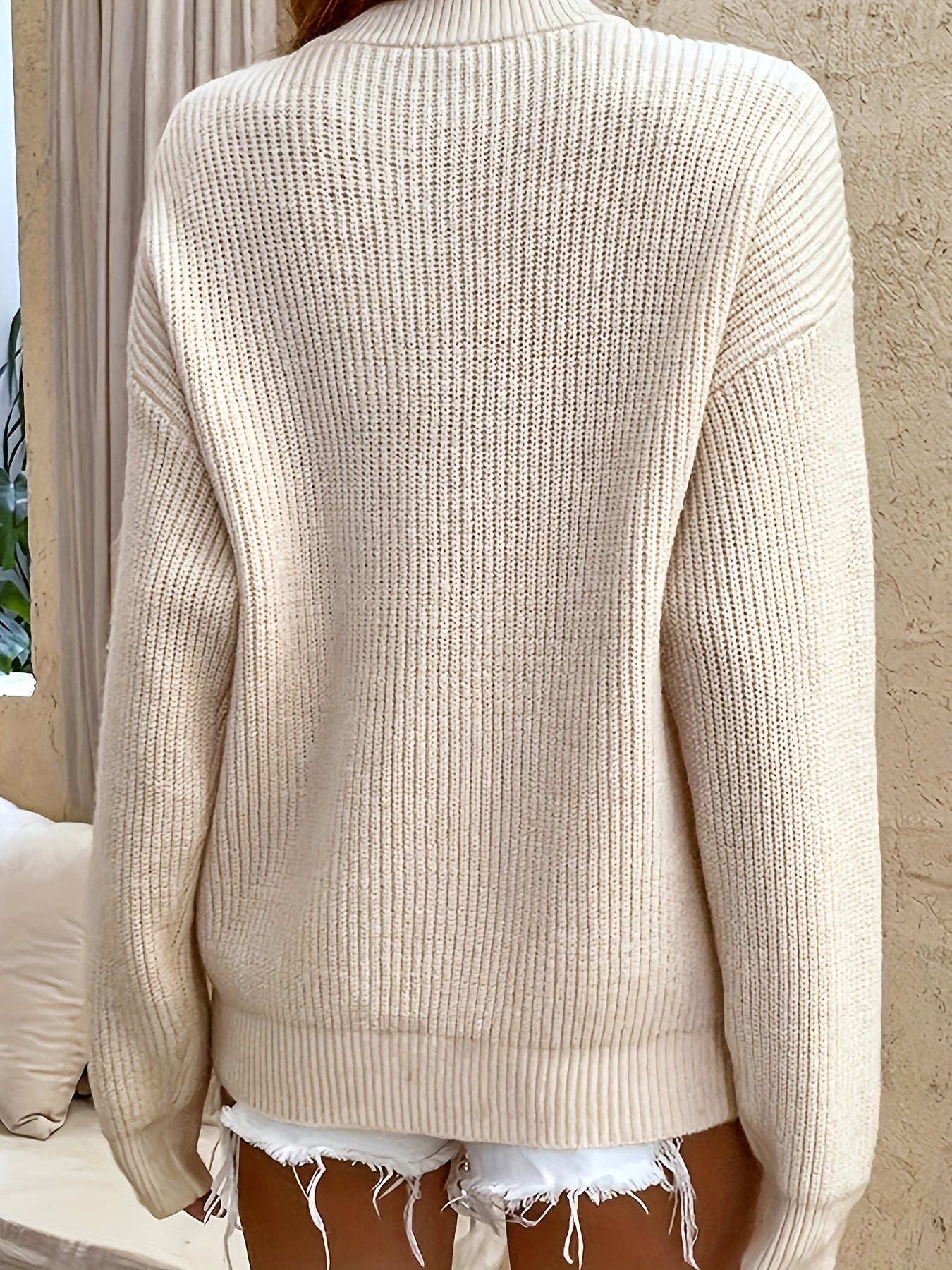 Relaxed Ribbed Knit Sweater with Henley Neckline
